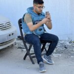 إبراهيم ظاهر شهيد الإنسانية: بين رحمة التمريض وعدسة الحقيقة